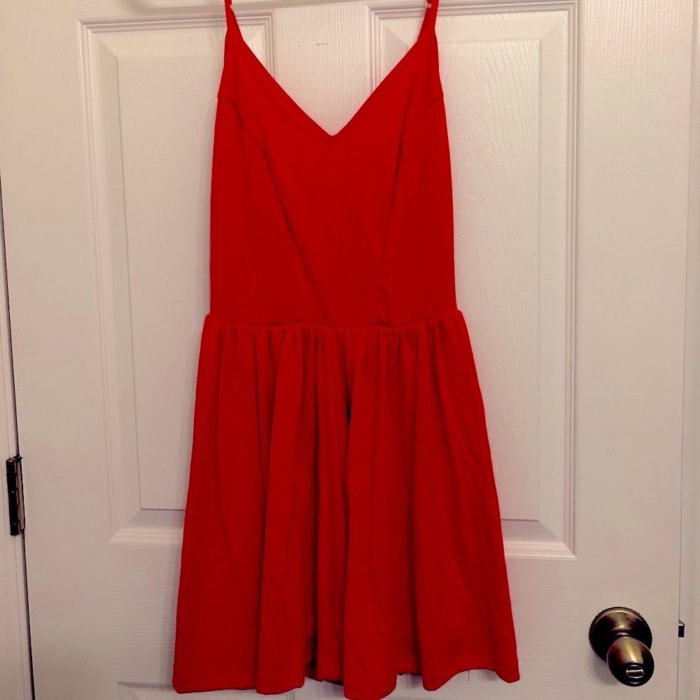 Orange romper but looks like flowy dress!